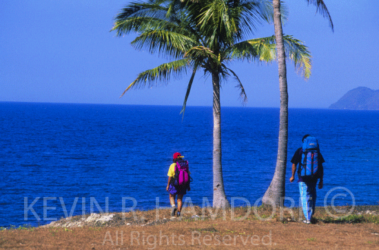 Hiking along Cebu coast near Badian Point, Cebu, Philippines. (PHCeb031)